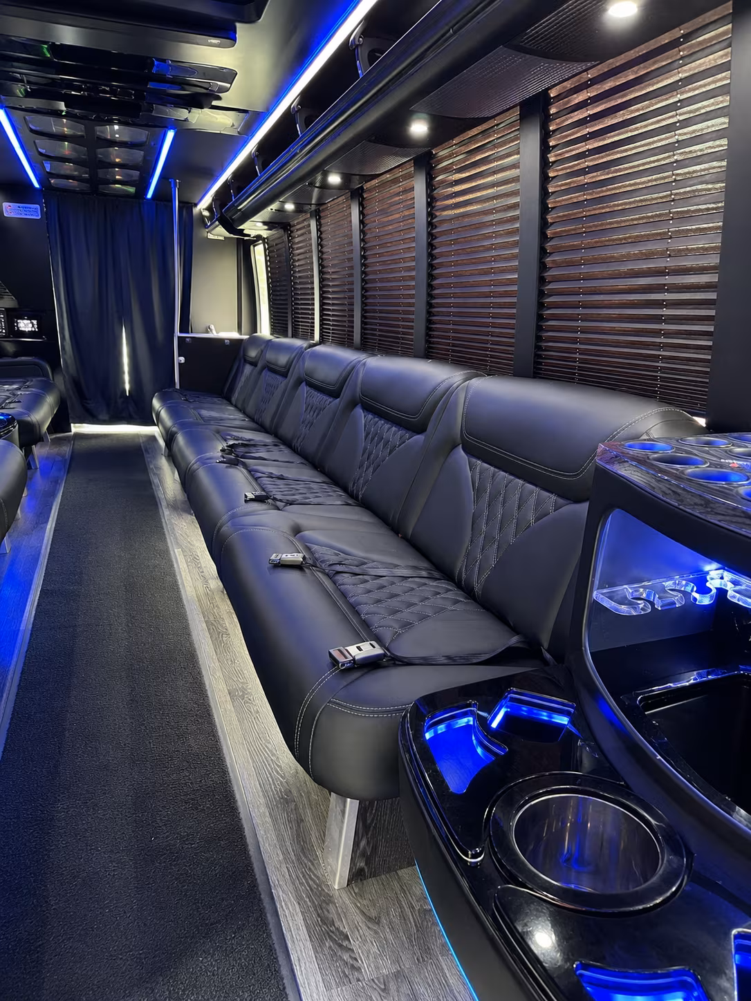 Group beside a Mercedes Sprinter limo in Tacoma