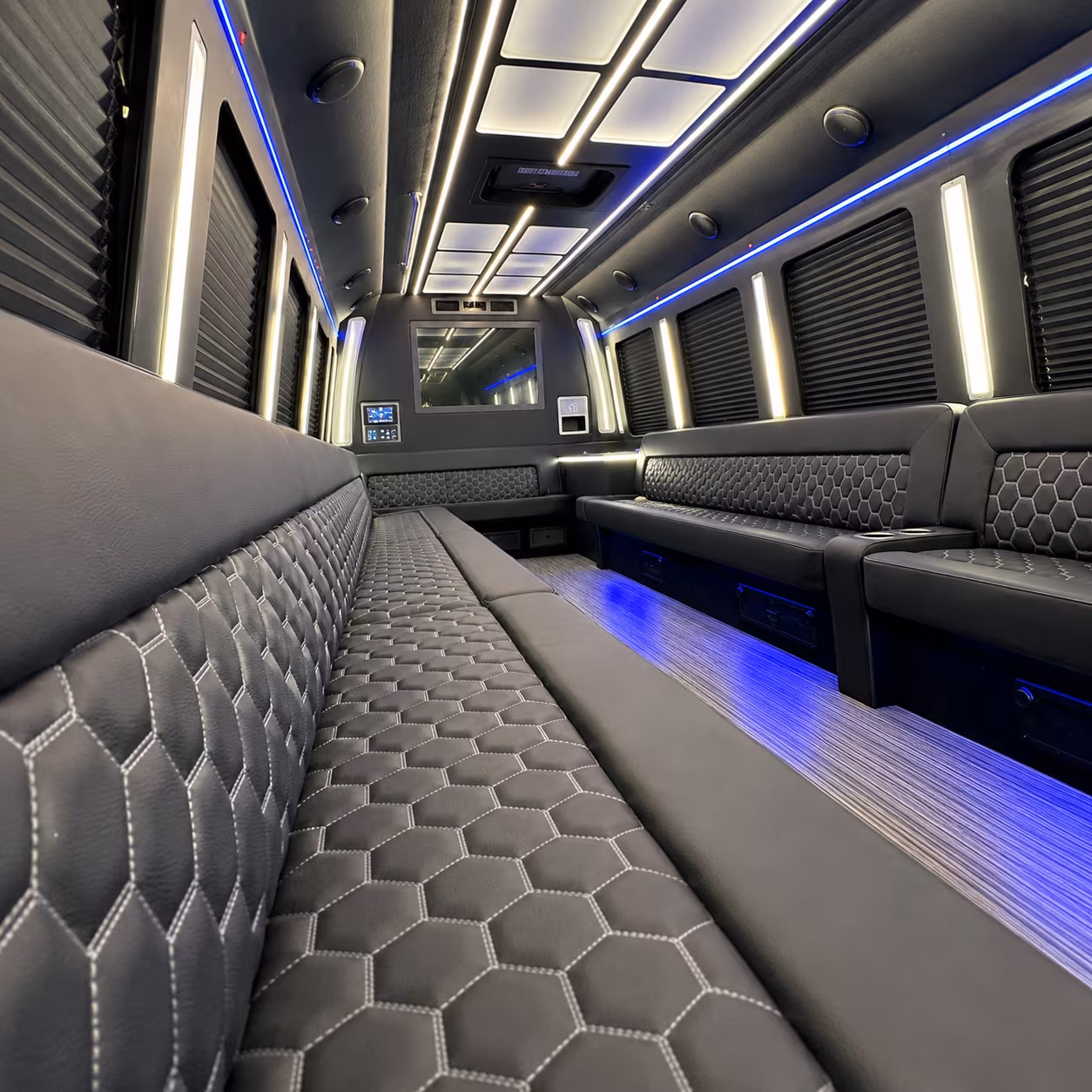 Wedding guests seated inside a party bus serving Tacoma